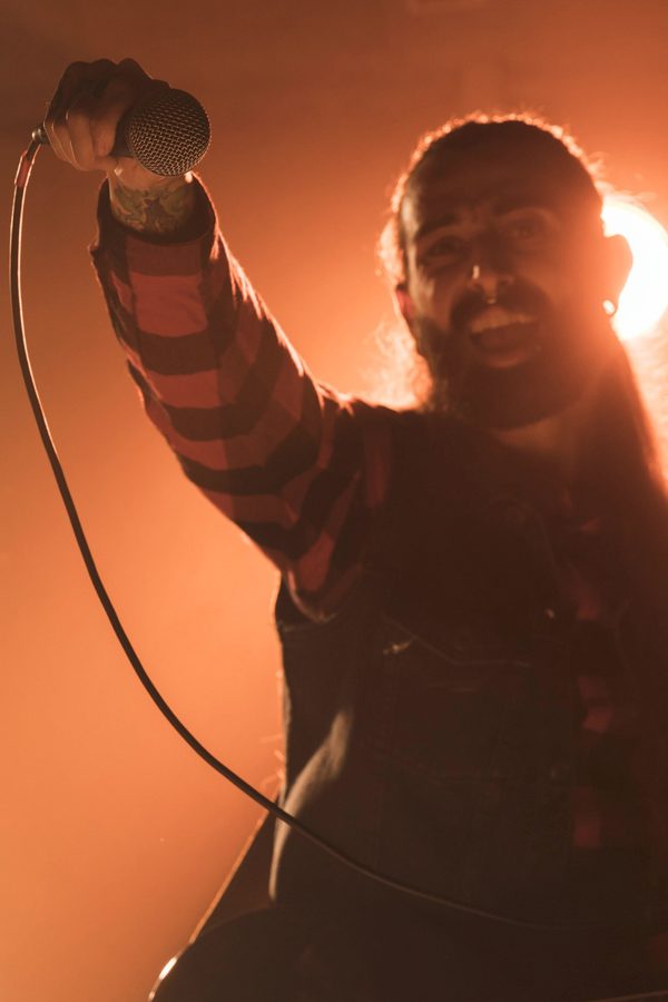 Vocalist under stage light